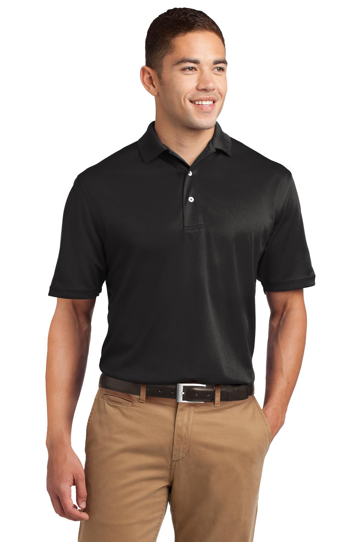 Tall male model 6'4 wearing a medium Sport-Tek Tall Dri-Mesh Polo in color black 100% polyester tee shirt against a white background