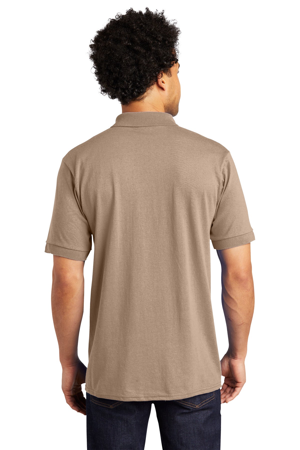 tall male model 6,4 wearing a sand medium port company polo t shirt with dyed to match buttons showing the back of the shirt against a white background