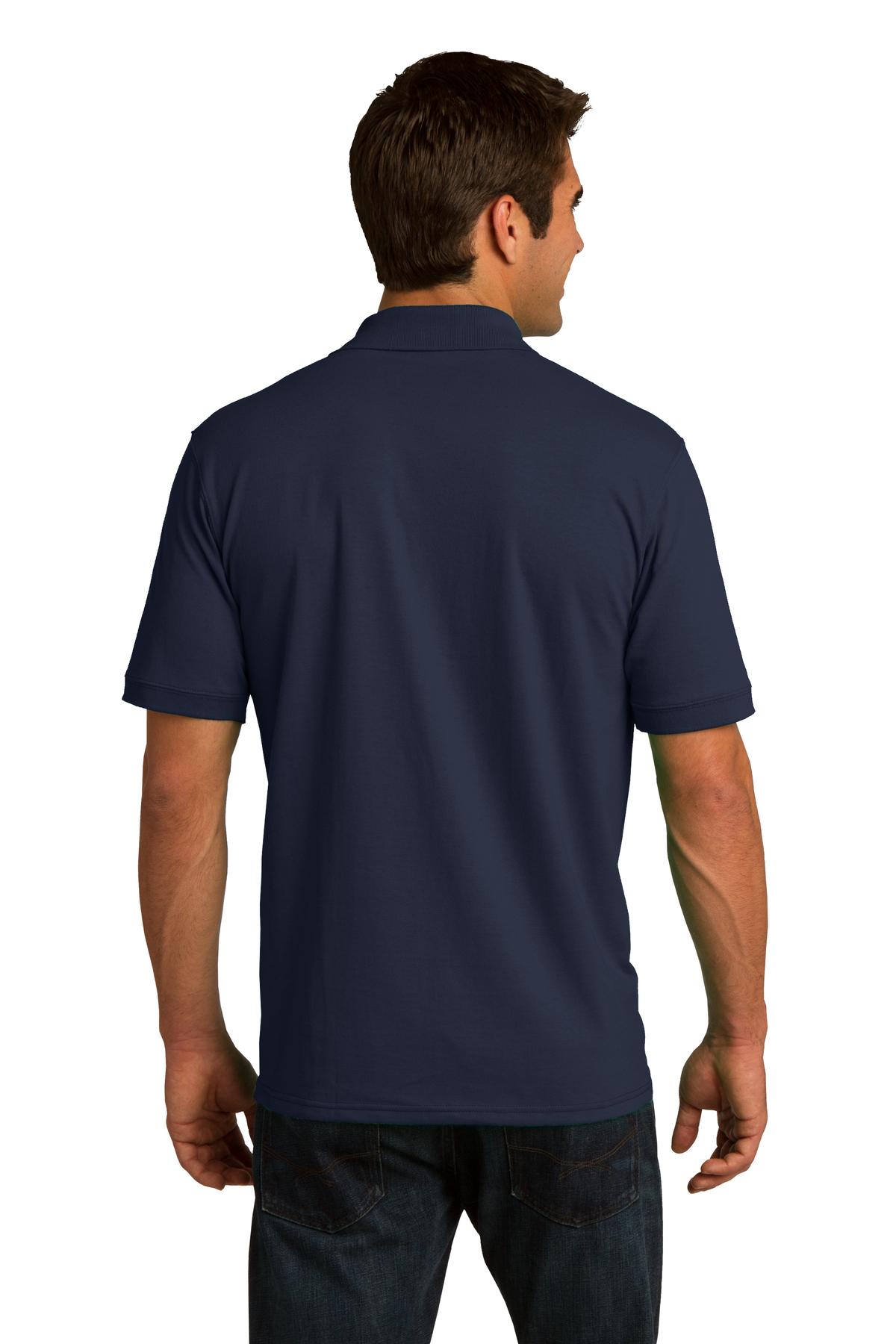 tall male model 6,4 wearing a deep navy medium port company polo t shirt with dyed to match buttons showing the back of the shirt against a white background
