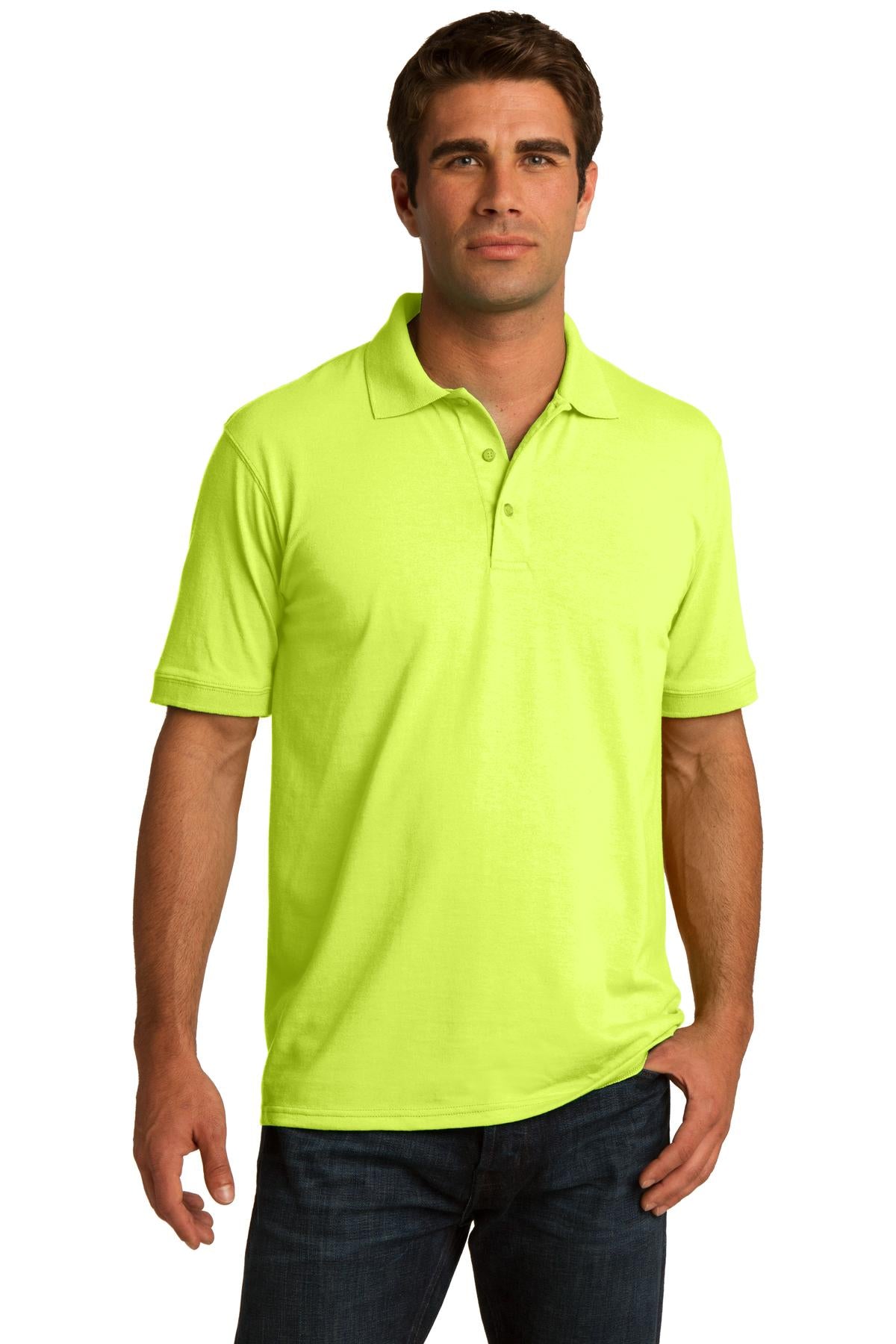 tall male model 6,4 wearing a safety green medium port company polo t shirt with dyed to match buttons against a white background