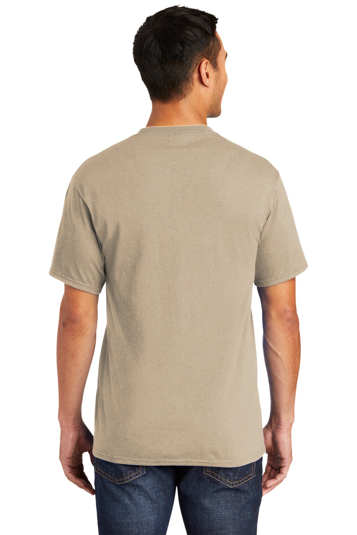Tall male model 6,3 wearing a medium desert sand port company T shirt durable soft and comfortable 50/50 cotton poly Tee showing the back of the shirt against a white background