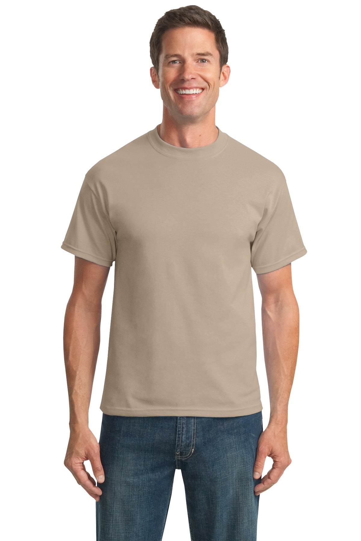 Tall male model 6,3 wearing a medium desert sand port company T shirt durable soft and comfortable 50/50 cotton poly Tee against a white background