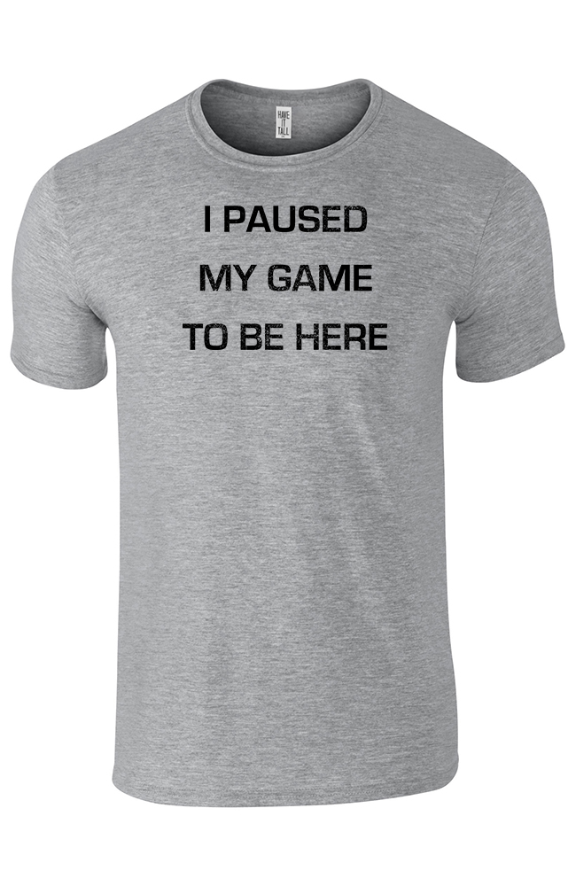 Graphite 100% cotton tee shirt with text that reads "I paused my game to be here" against a white background
