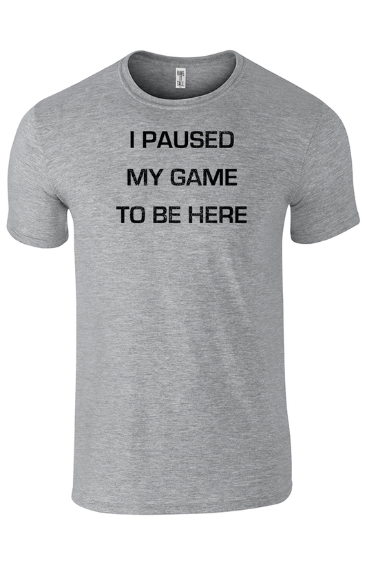 Graphite 100% cotton tee shirt with text that reads "I paused my game to be here" against a white background