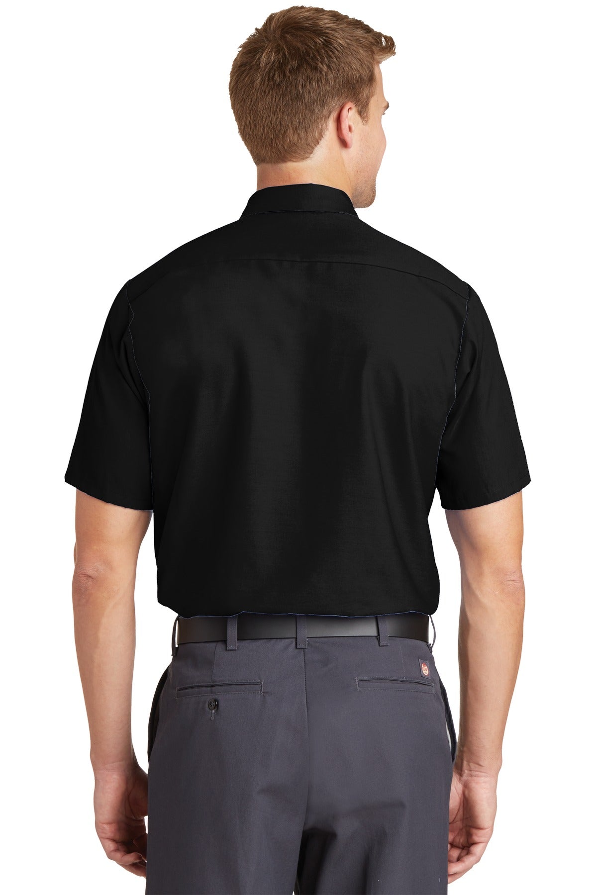 Tall male model 6'3 wearing a medium Red Kap Long Size Short Sleeve button up tee shirt Industrial Work Shirt in black with dyed buttons showing the back of the shirt against a white background