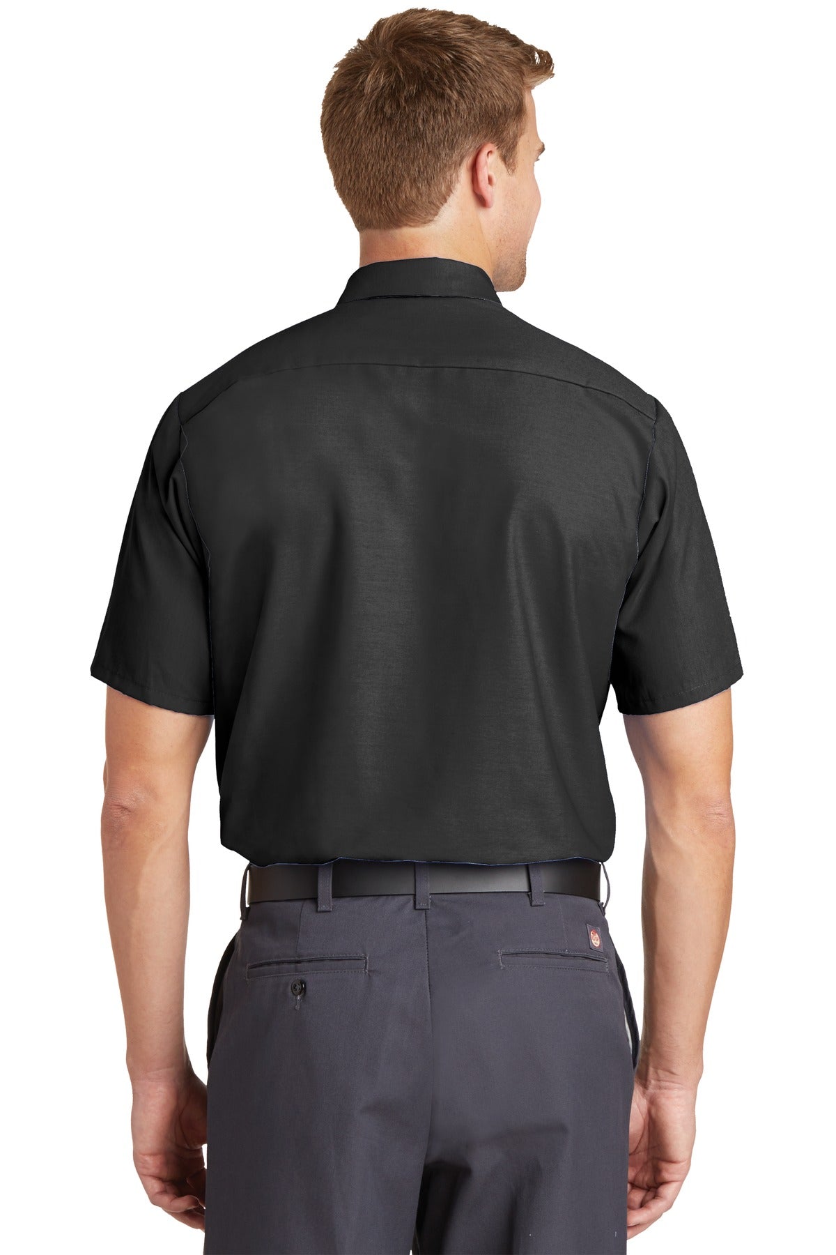 Tall male model 6'3 wearing a medium Red Kap Long Size Short Sleeve button up tee shirt Industrial Work Shirt in charcoal with dyed buttons showing the back of the shirt against a white background