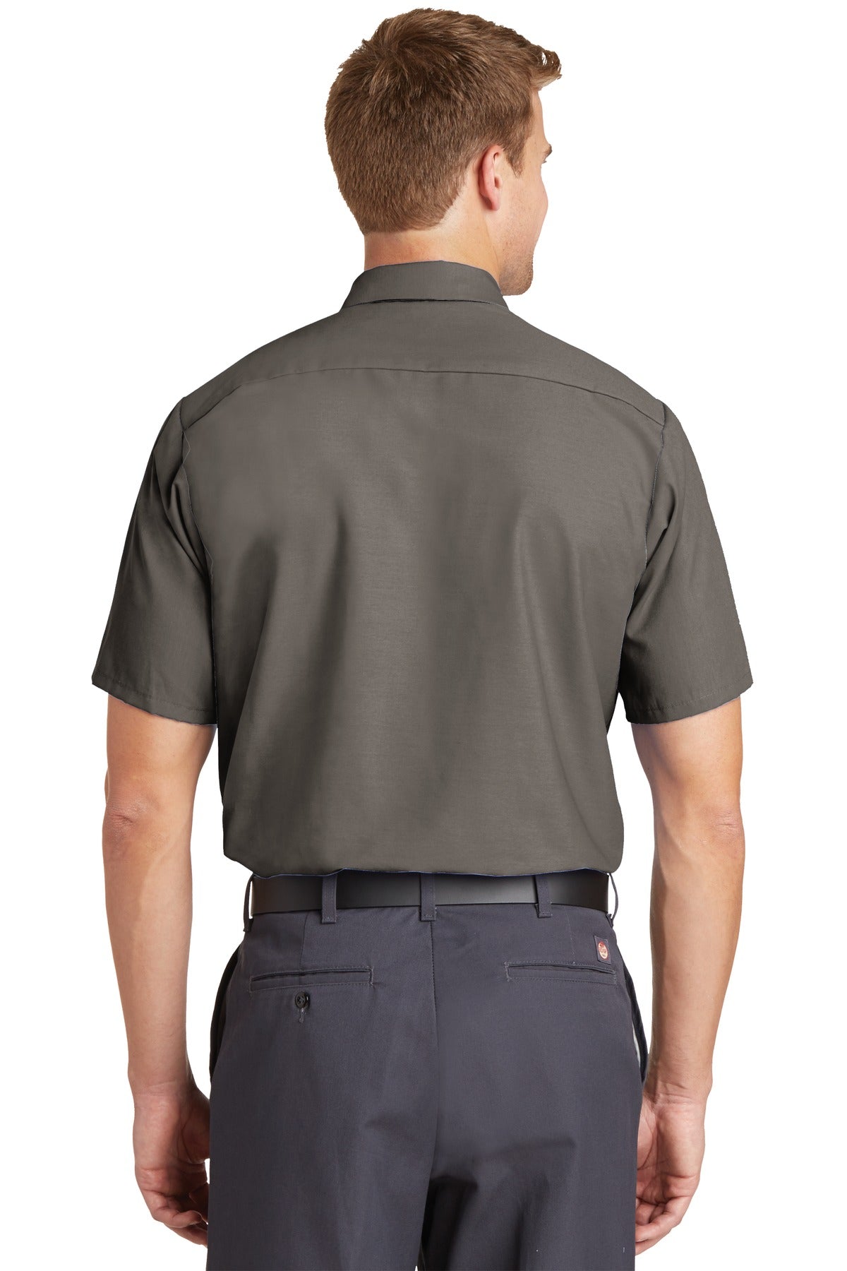 Tall male model 6'3 wearing a medium Red Kap Long Size Short Sleeve button up tee shirt Industrial Work Shirt in grey with dyed buttons showing the back of the shirt against a white background