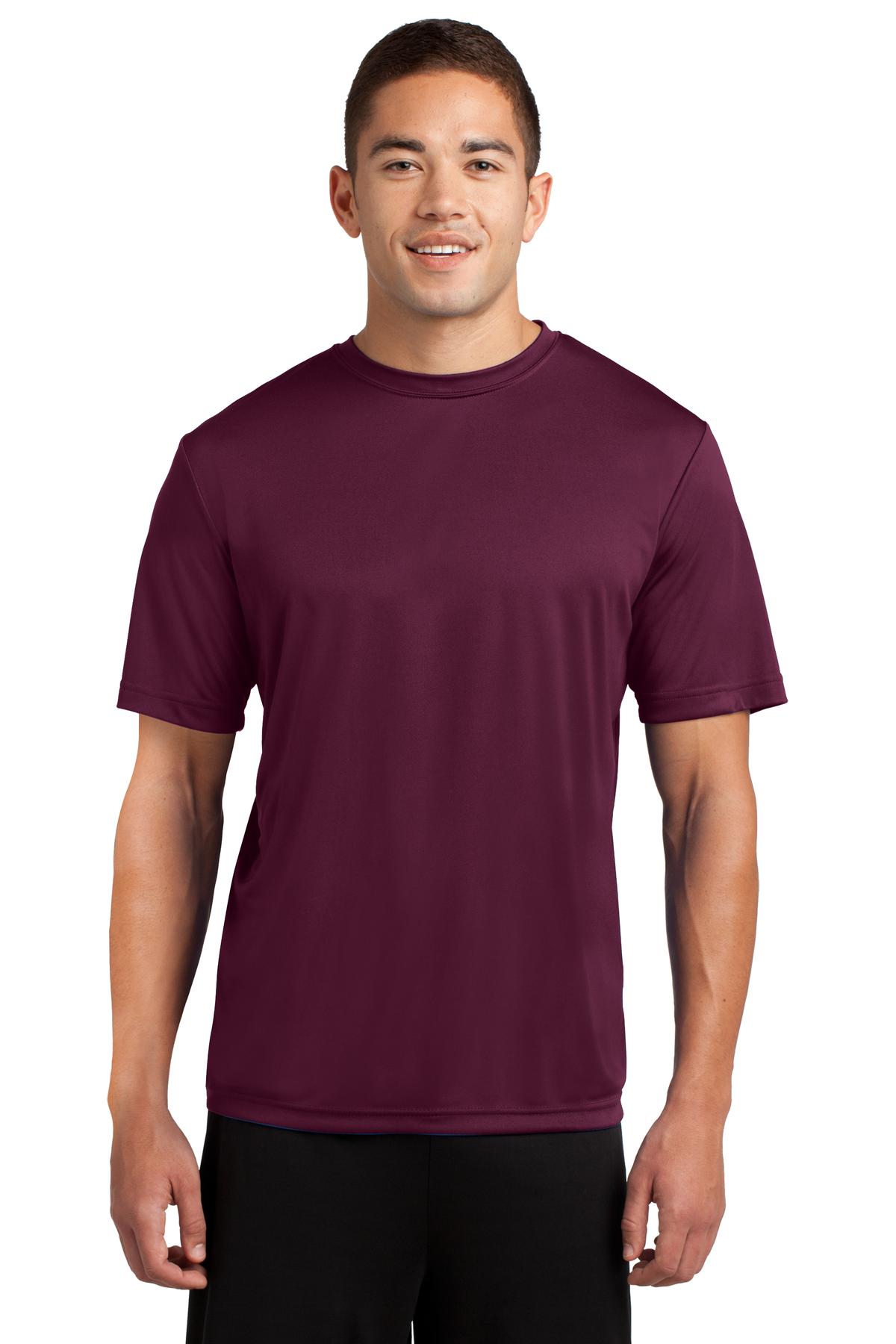 Tall male model 6,2 wearing a large maroon t shirt light weight breathable and roomy 100% polyester against a white background