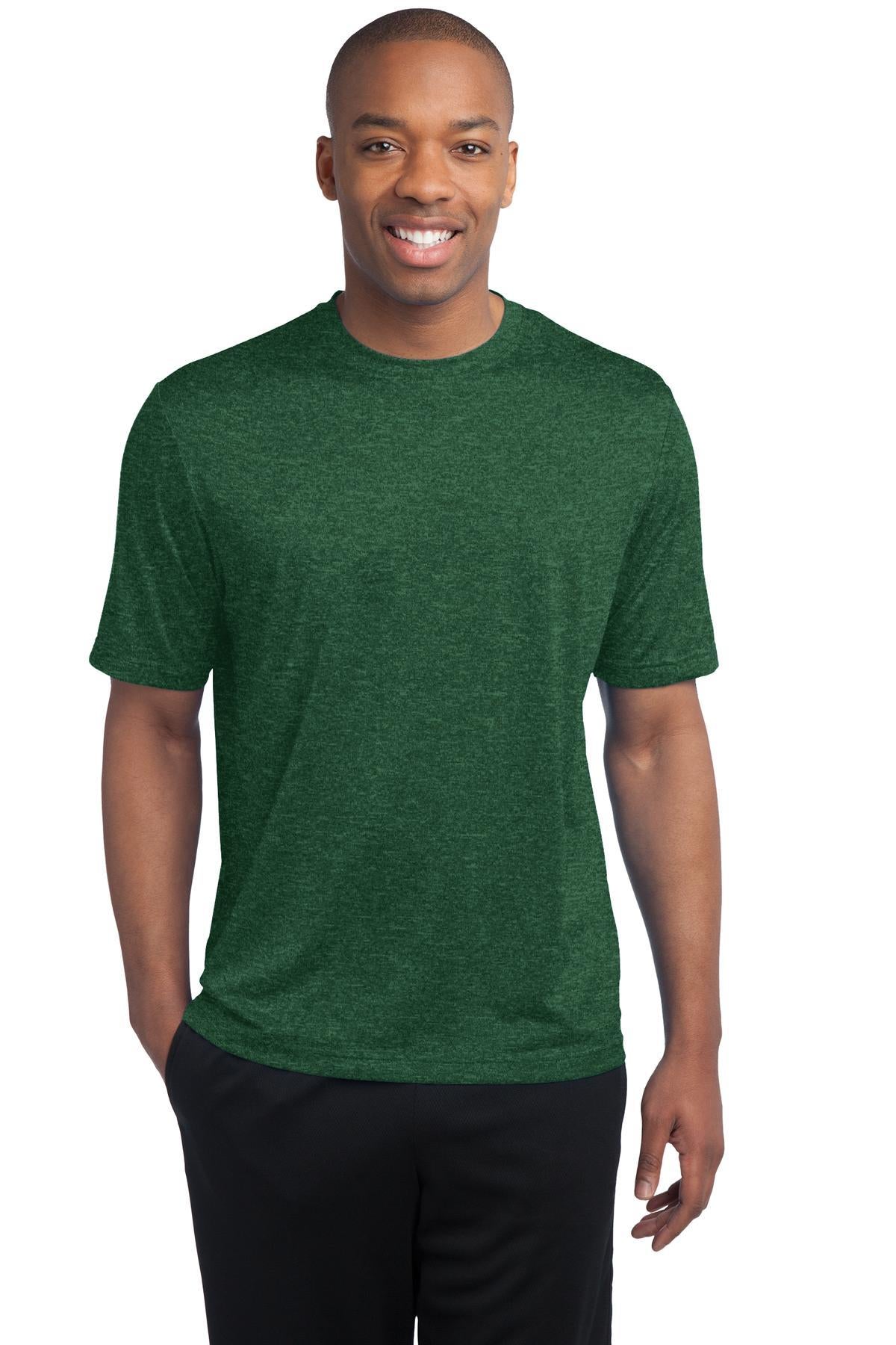 tall male model 6'4 wearing a medium forest green colored T shirt 100% poly athletic tee against a white background