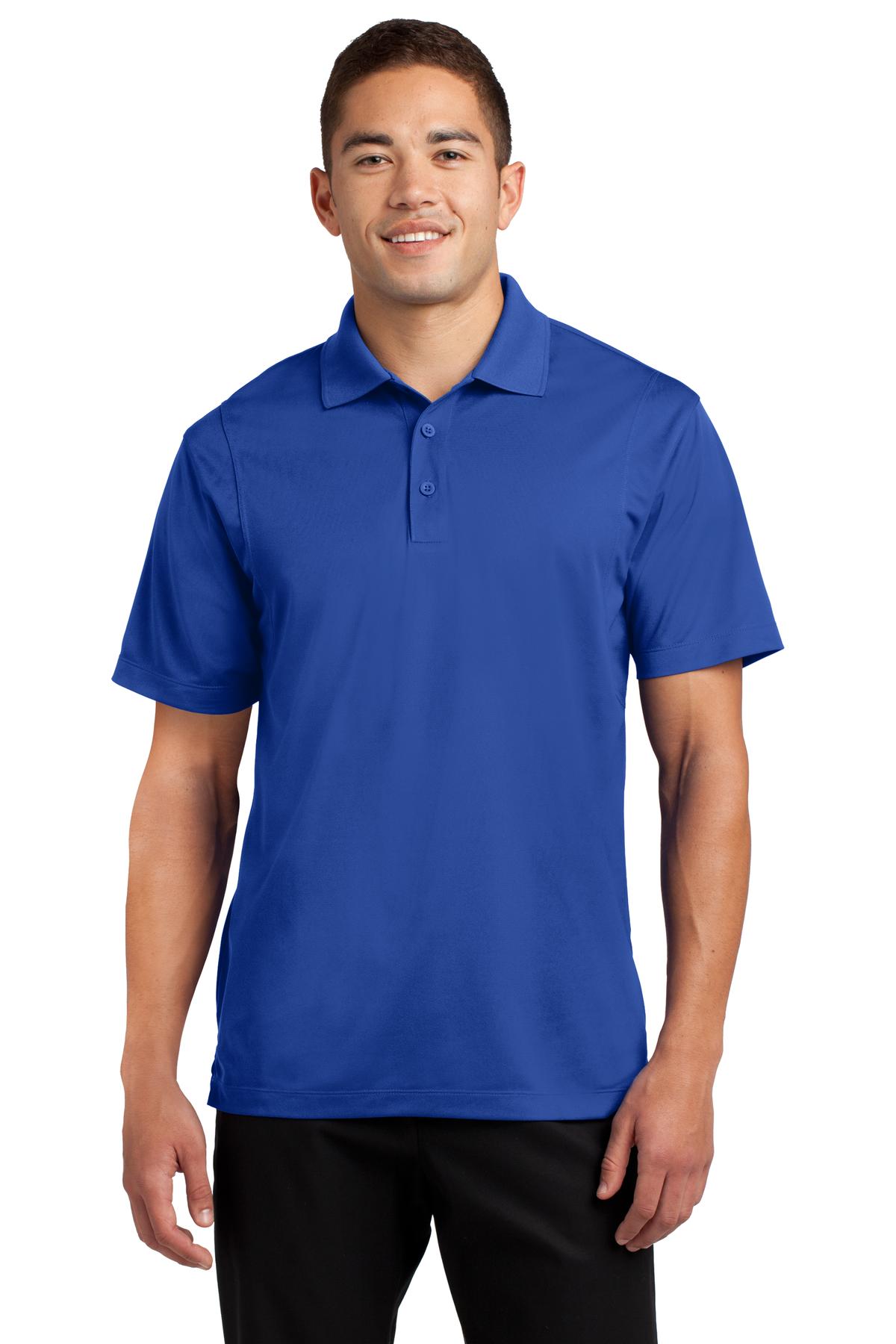 Tall male model 6'4 wearing a medium sport tek polo t shirt in true royal 100% polyester tee with dyed buttons against a white background