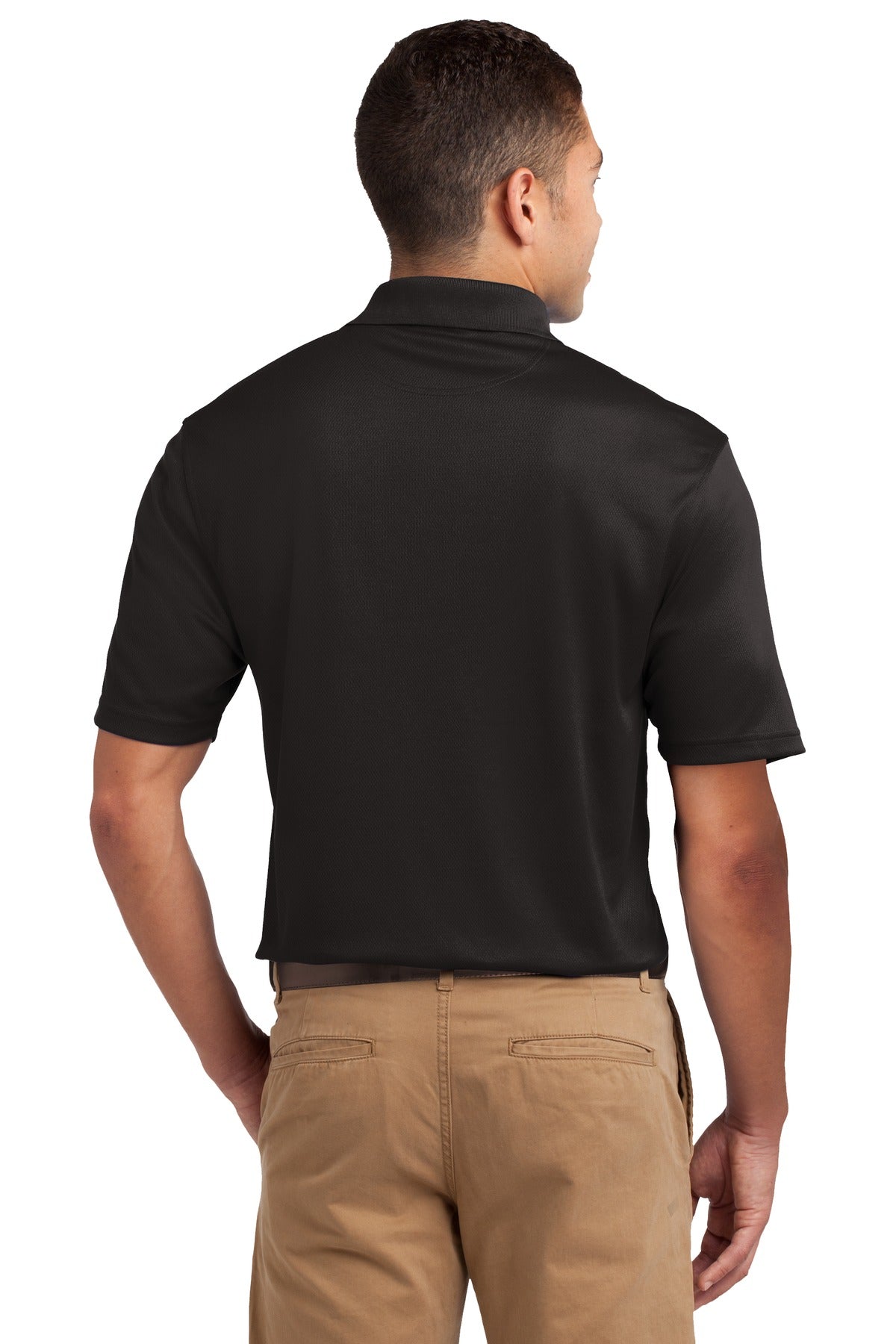 Tall male model 6'4 wearing a medium Sport-Tek Tall Dri-Mesh Polo in color black 100% polyester tee shirt showing the back of the shirt against a white background