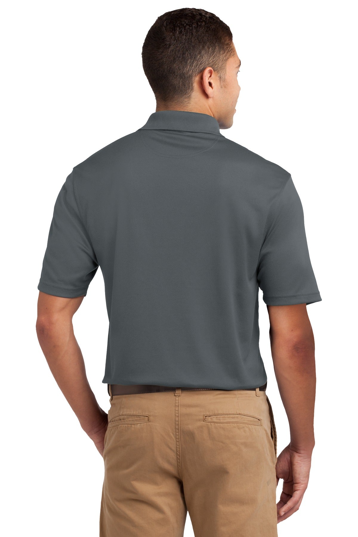 Tall male model 6'4 wearing a medium Sport-Tek Tall Dri-Mesh Polo in color steel 100% polyester tee shirt showing the back of the shirt against a white background