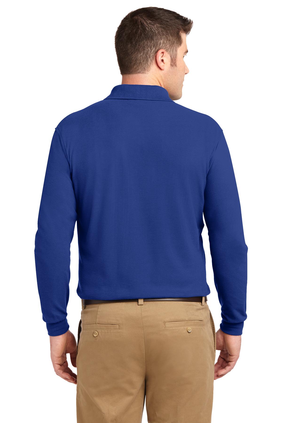 Tall male model 6'6 wearing a large royal Port Authority Tall Silk Touch Long Sleeve Polo showing the back of the shirt against a white background