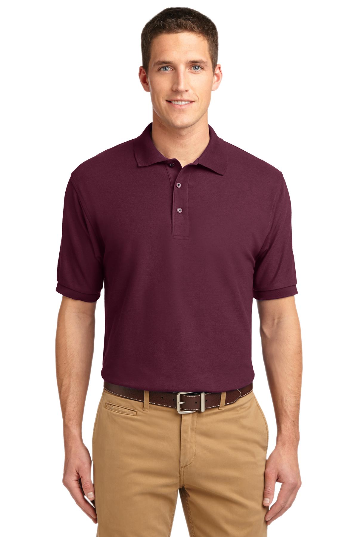 Tall male model 6'3 wearing a small Port Authority Tall Silk Touch Polo in color burgundy with dyed buttons cotton/poly blend against a white background