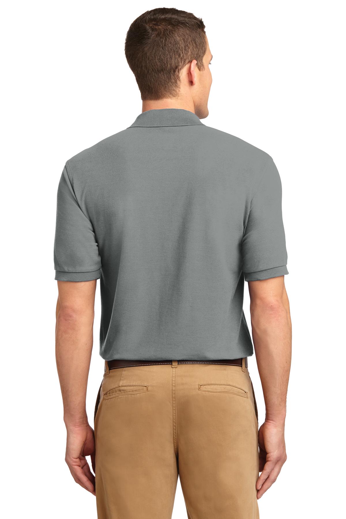 Tall male model 6'3 wearing a small Port Authority Tall Silk Touch Polo in color grey with dyed buttons cotton/poly blend showing the back of the shirt against a white background