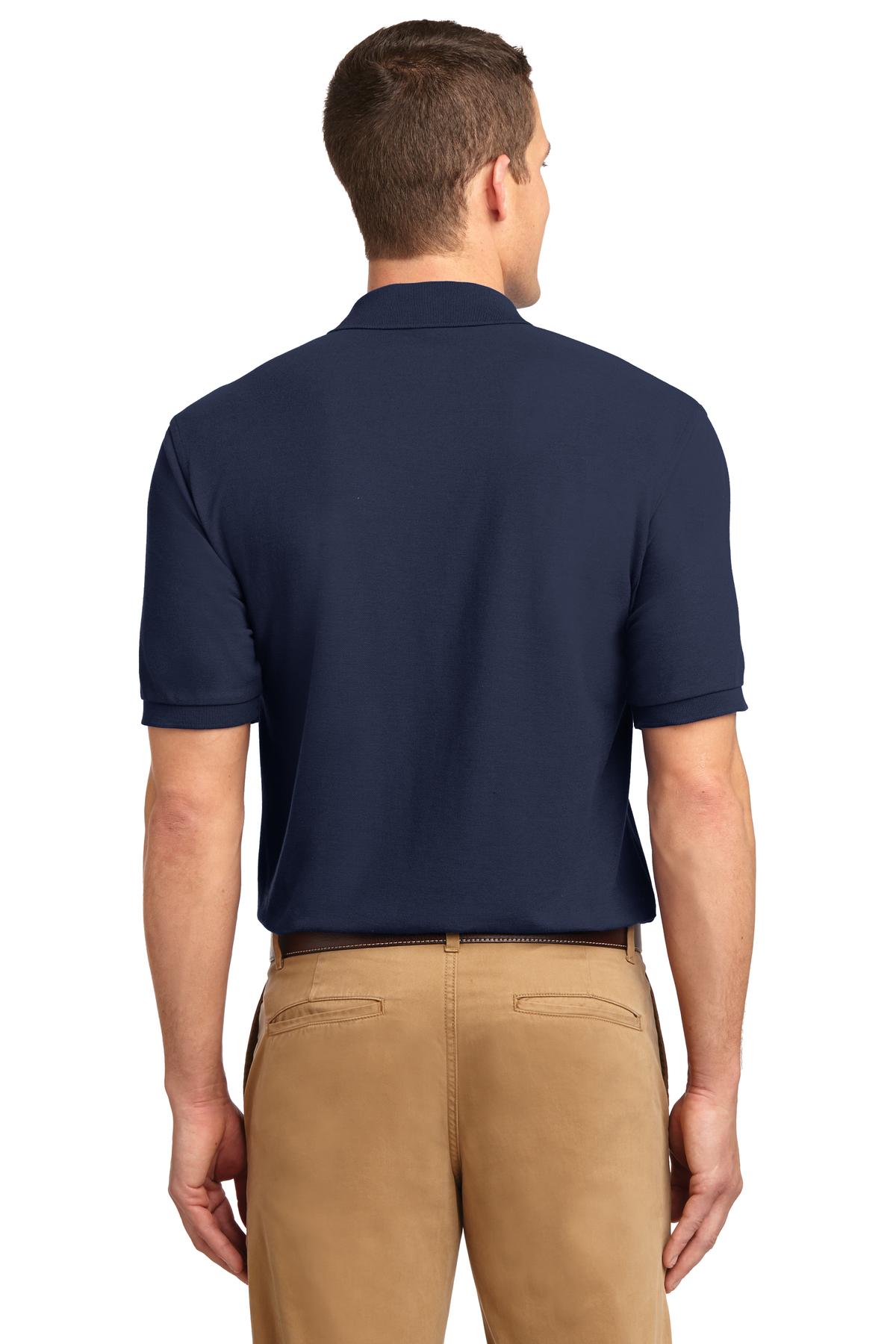 Tall male model 6'3 wearing a small Port Authority Tall Silk Touch Polo in color navy with dyed buttons cotton/poly blend showing the back of the shirt against a white background