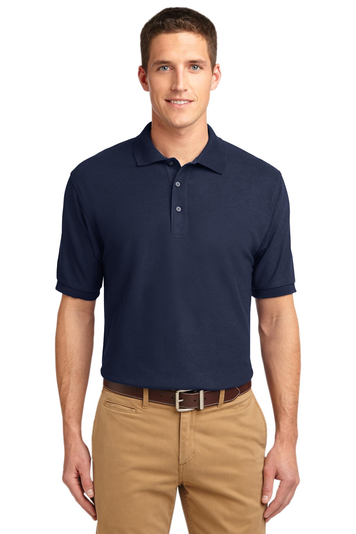 Tall male model 6'3 wearing a small Port Authority Tall Silk Touch Polo in color navy with dyed buttons cotton/poly blend against a white background