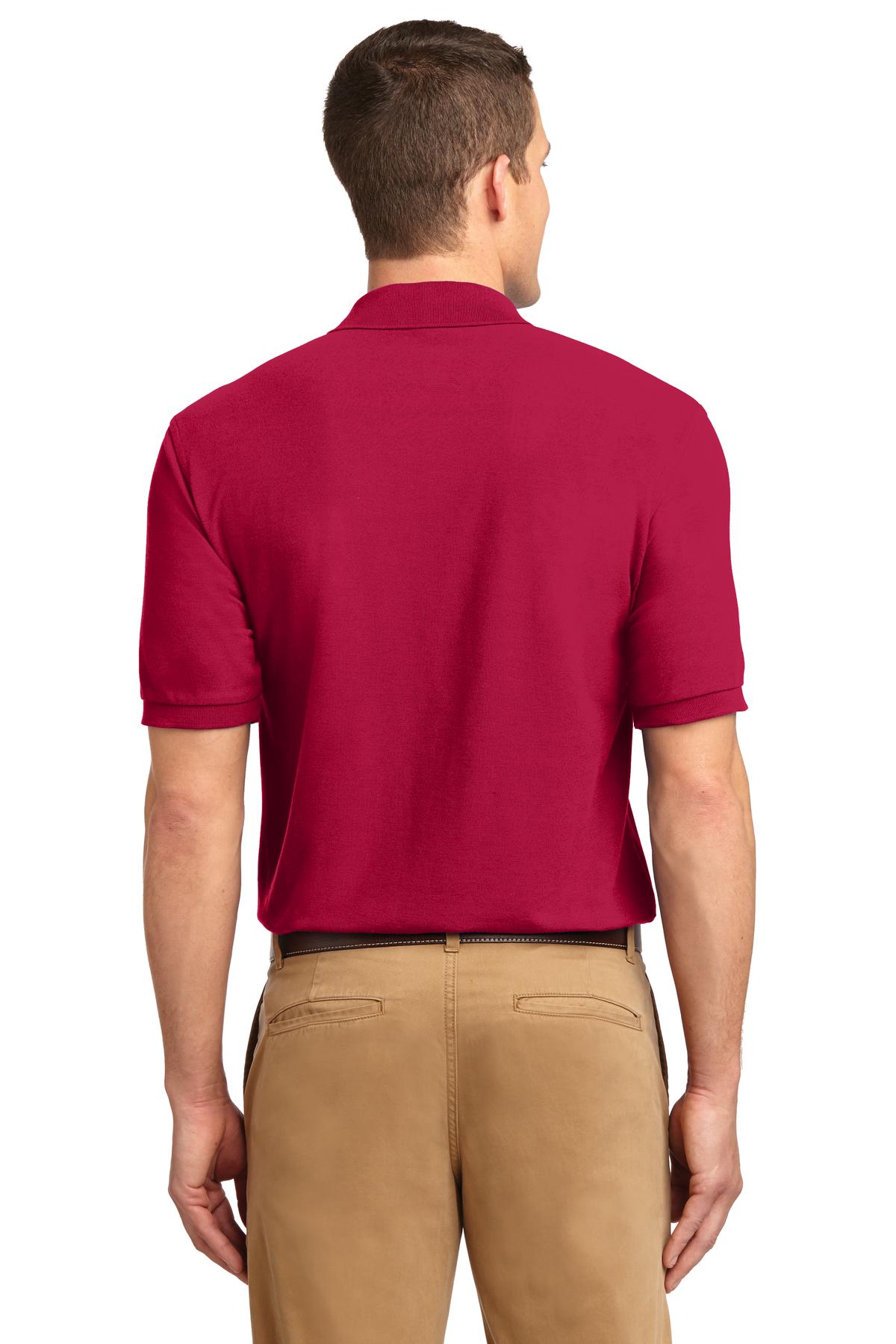 Tall male model 6'3 wearing a small Port Authority Tall Silk Touch Polo in color red with dyed buttons cotton/poly blend showing the back of the shirt against a white background