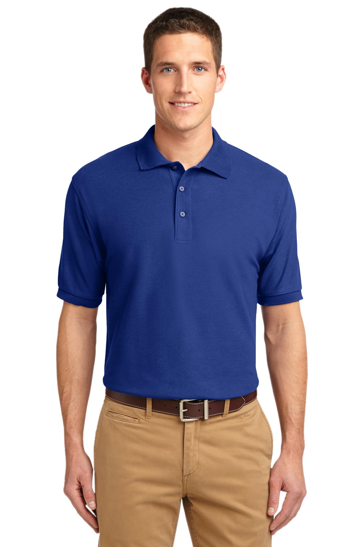 Tall male model 6'3 wearing a small Port Authority Tall Silk Touch Polo in color royal with dyed buttons cotton/poly blend against a white background