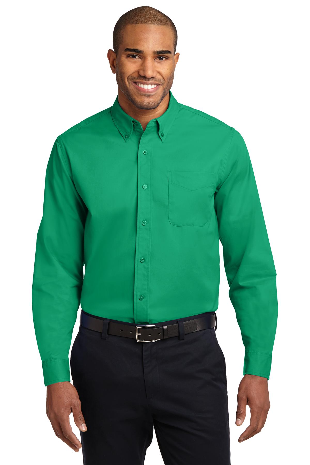 Tall male model 6,3 wearing a large long sleeve port authority button up shirt with chest pocket in color court green against a white background