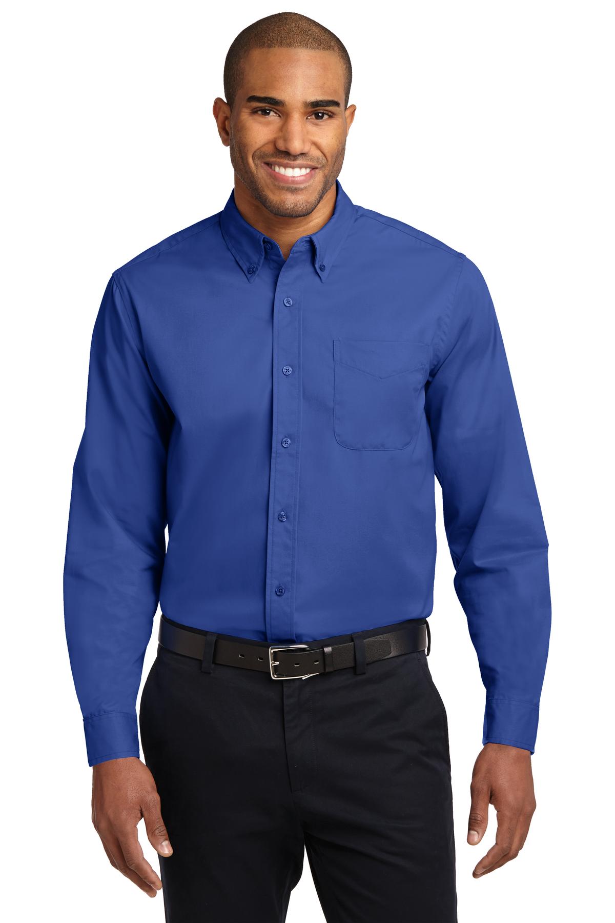 Tall male model 6,3 wearing a large long sleeve port authority button up shirt with chest pocket in color Royal against a white background