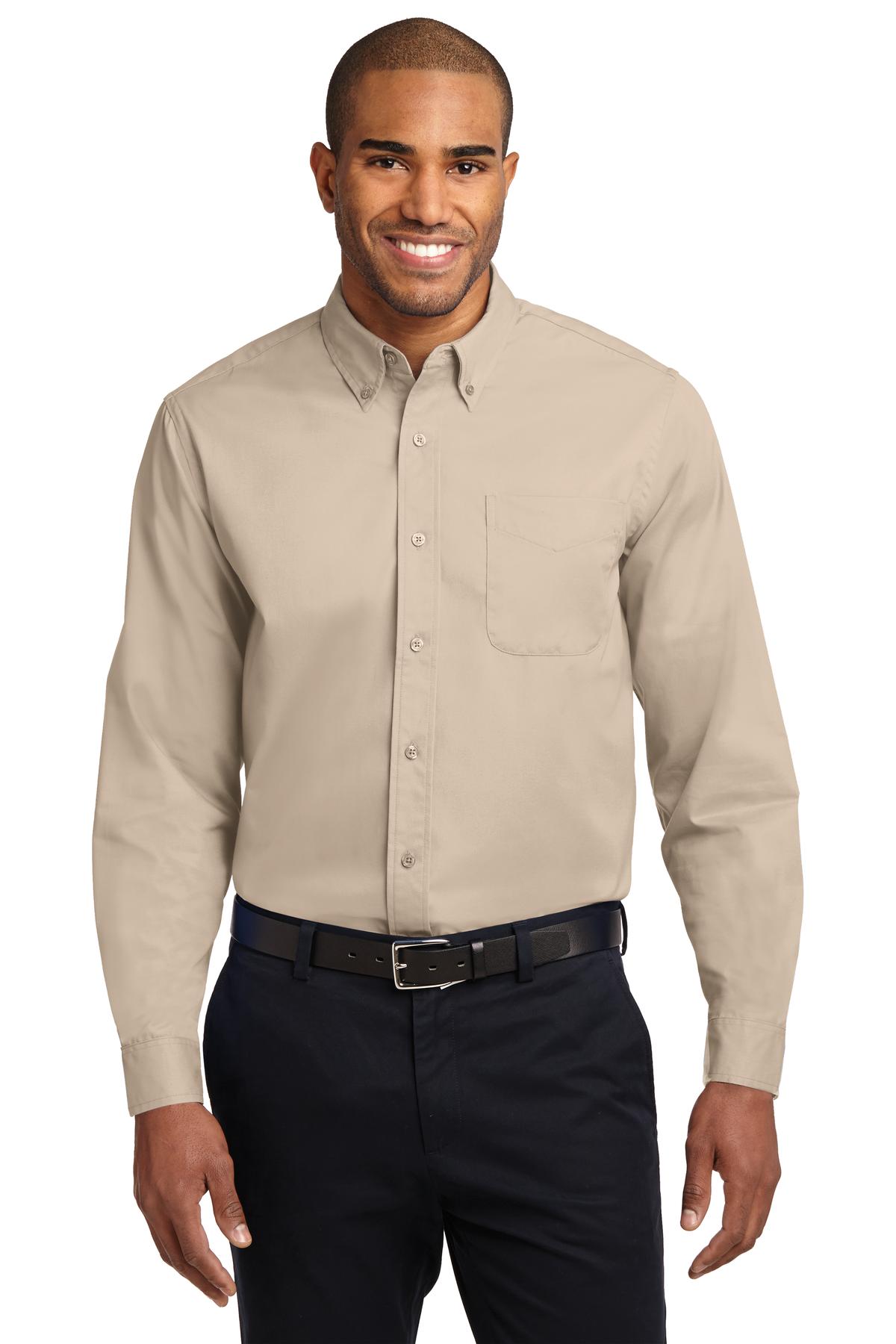 Tall male model 6,3 wearing a large long sleeve port authority button up shirt with chest pocket in color Tan against a white background