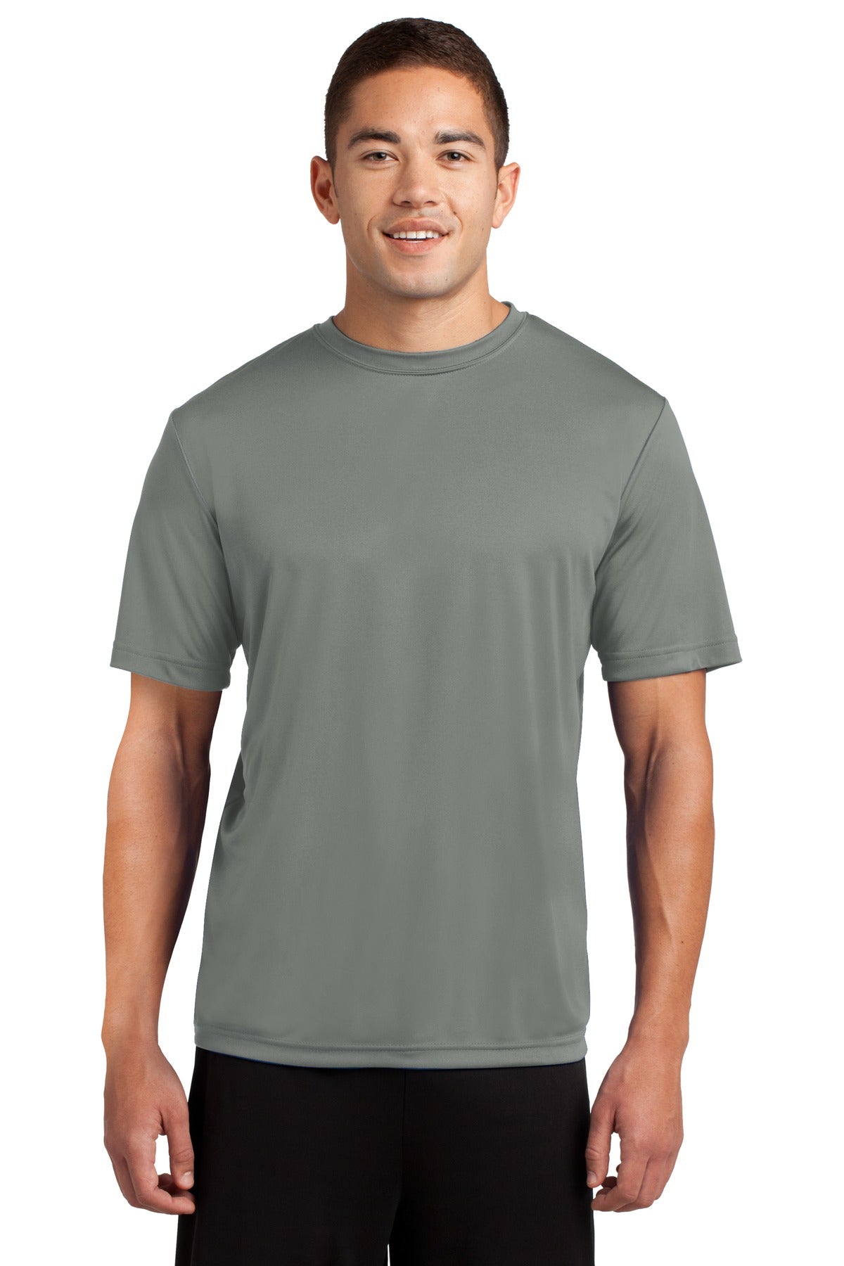 Tall male model 6,2 wearing a large grey concrete t shirt light weight breathable and roomy 100% polyester tee against a white background