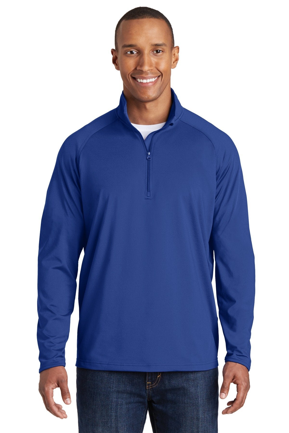 Tall male model 6'5 wearing a sport tek true royal colored medium sport wick 90/10 poly/spandex designed for comfort against a white background
