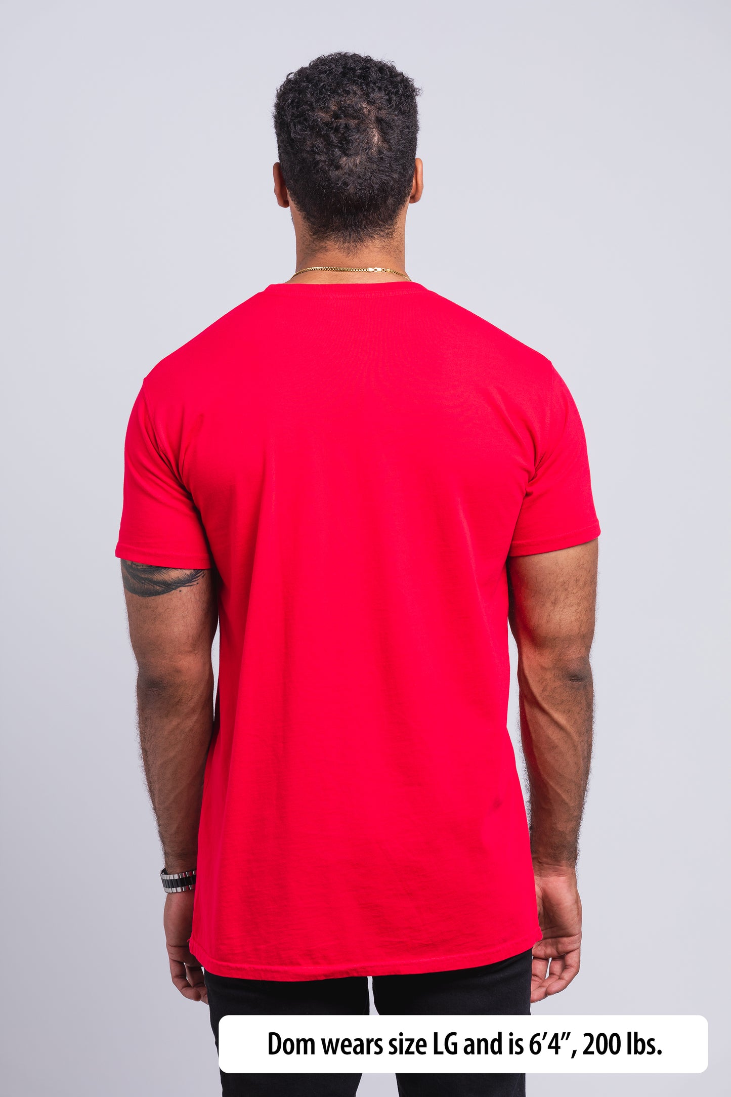 Have It Tall Classic Tall T Shirt worn by a male model (6'4" tall) wearing a size large  red standing in a tall apparel showroom.