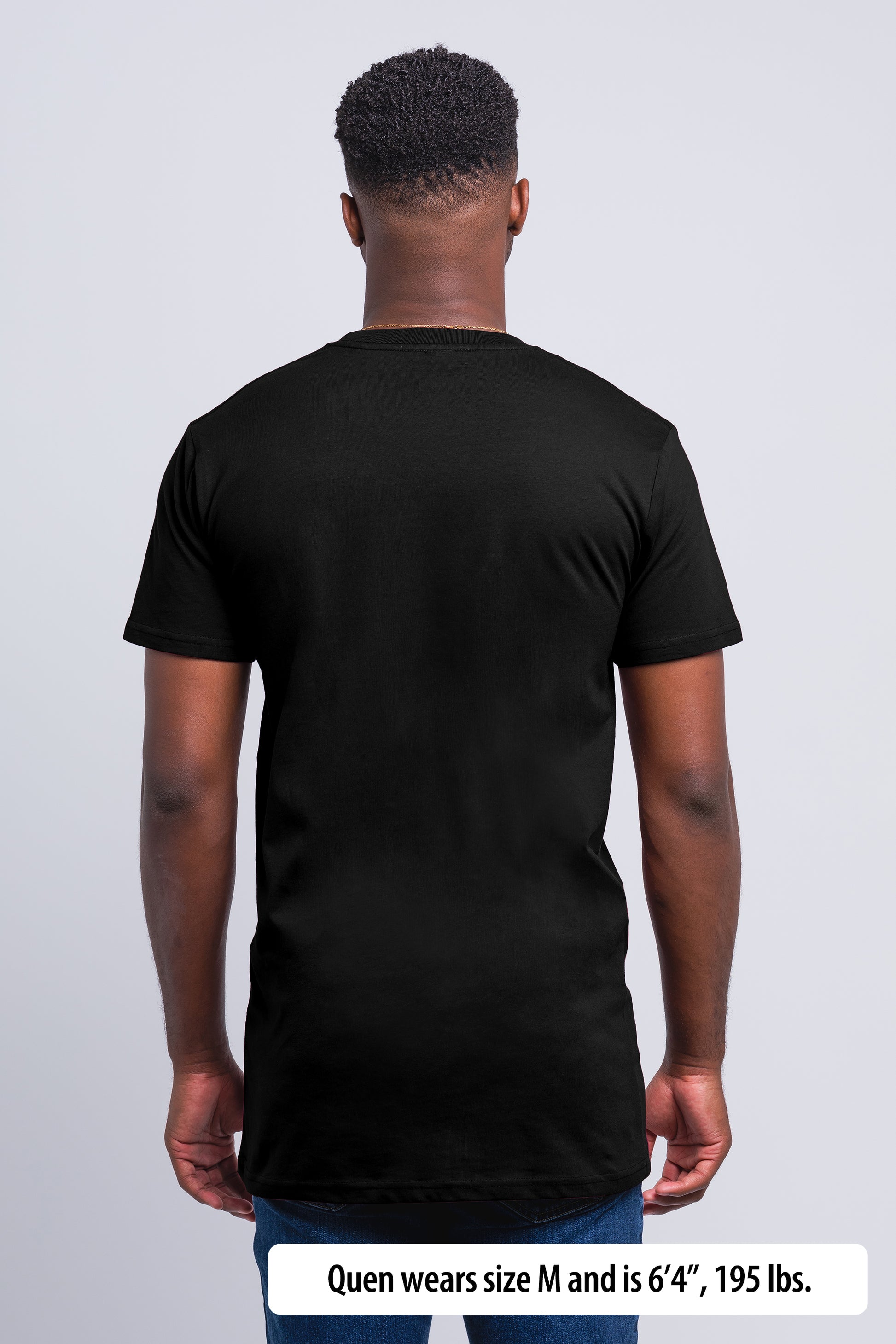 Have It Tall Fashion Fit Tall T Shirt worn by a male model (6'4" tall) wearing a size medium Black standing in a tall apparel showroom.