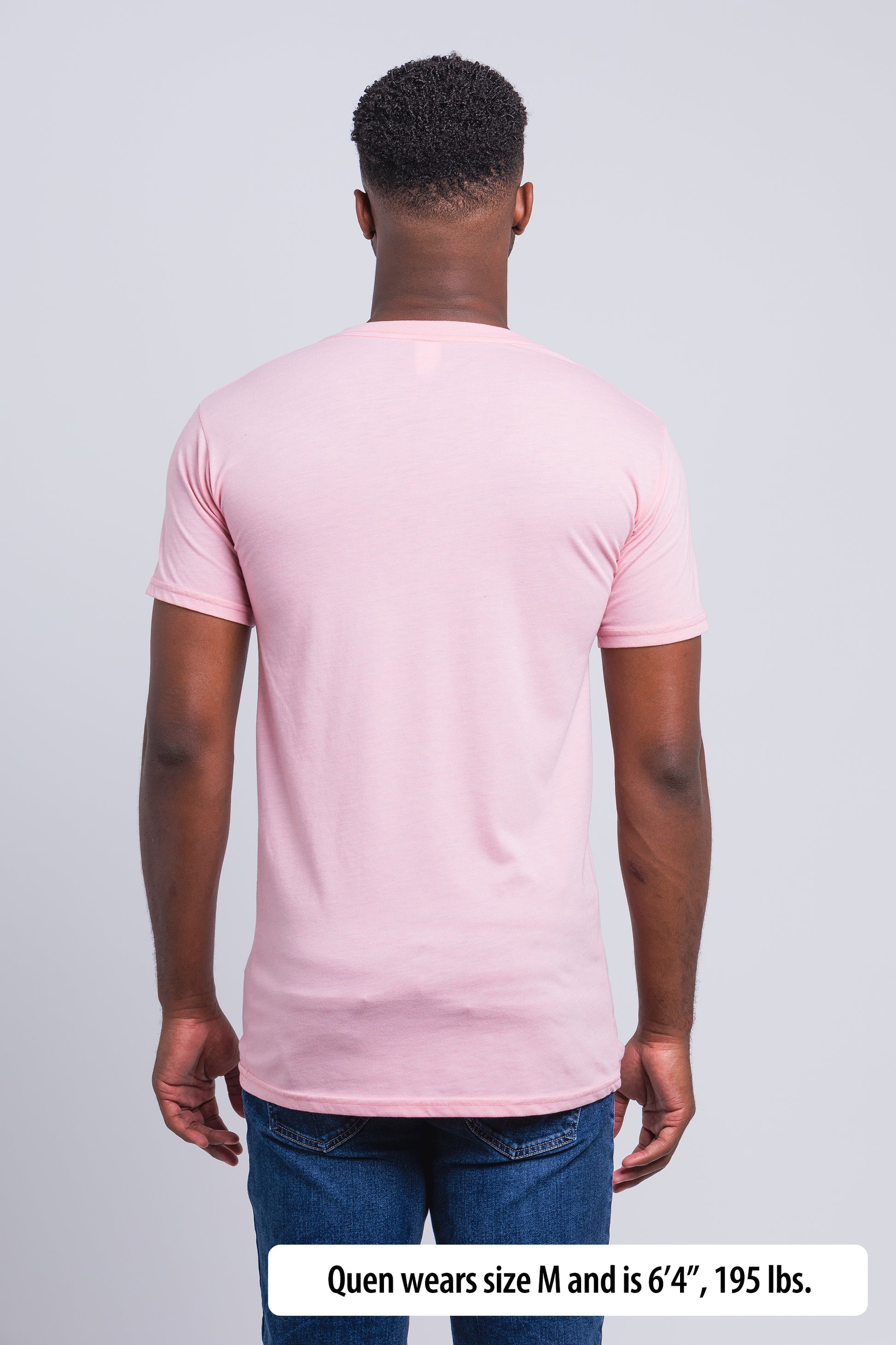 Have It Tall V-Neck Tall T-Shirt worn by a male model (6'4" tall) wearing a size Medium Rose standing in a tall apparel showroom.