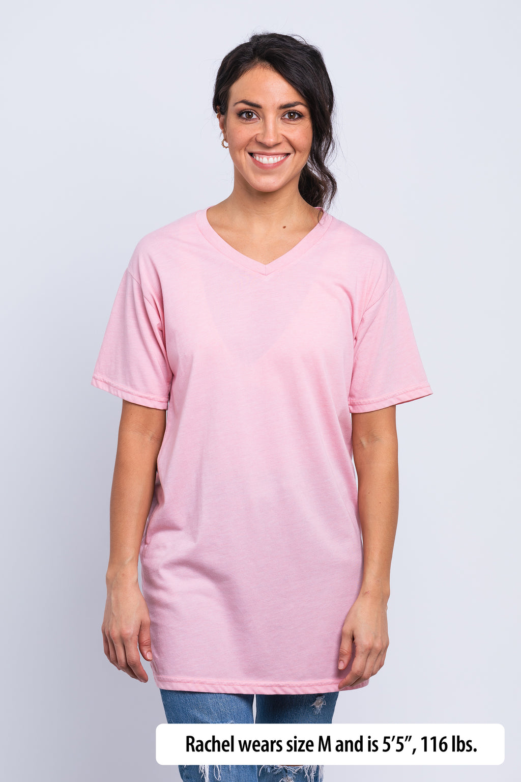 Have It Tall V-Neck Tall T-Shirt worn by a Female model (5'5" tall) wearing a size Medium Rose standing in a tall apparel showroom.