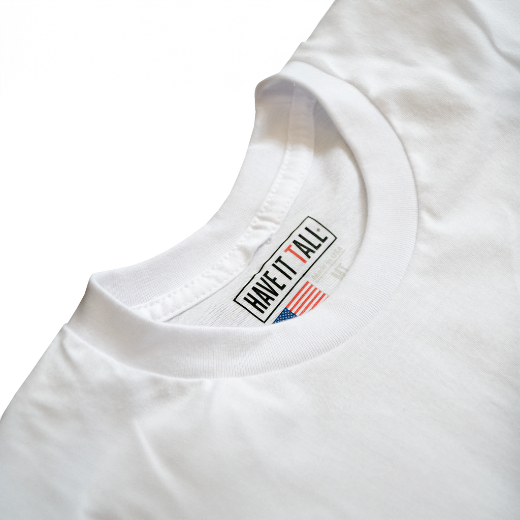 close up shot of Have It Tall made in USA T shirt in white 100% cotton luxury soft tee for tall men and women against a white background