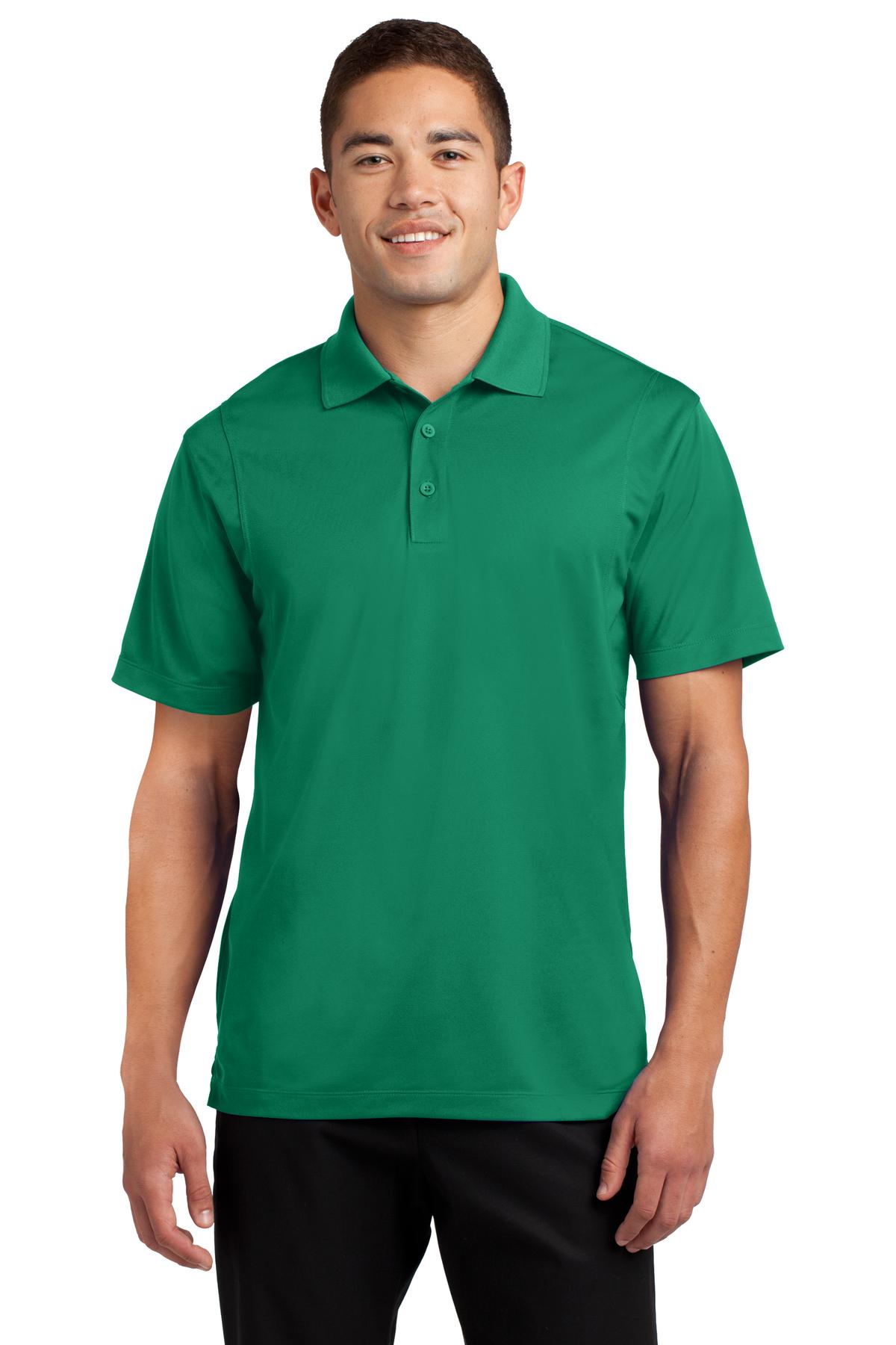 Tall male model 6'4 wearing a medium sport tek polo t shirt in kelly green 100% polyester tee with dyed buttons against a white background