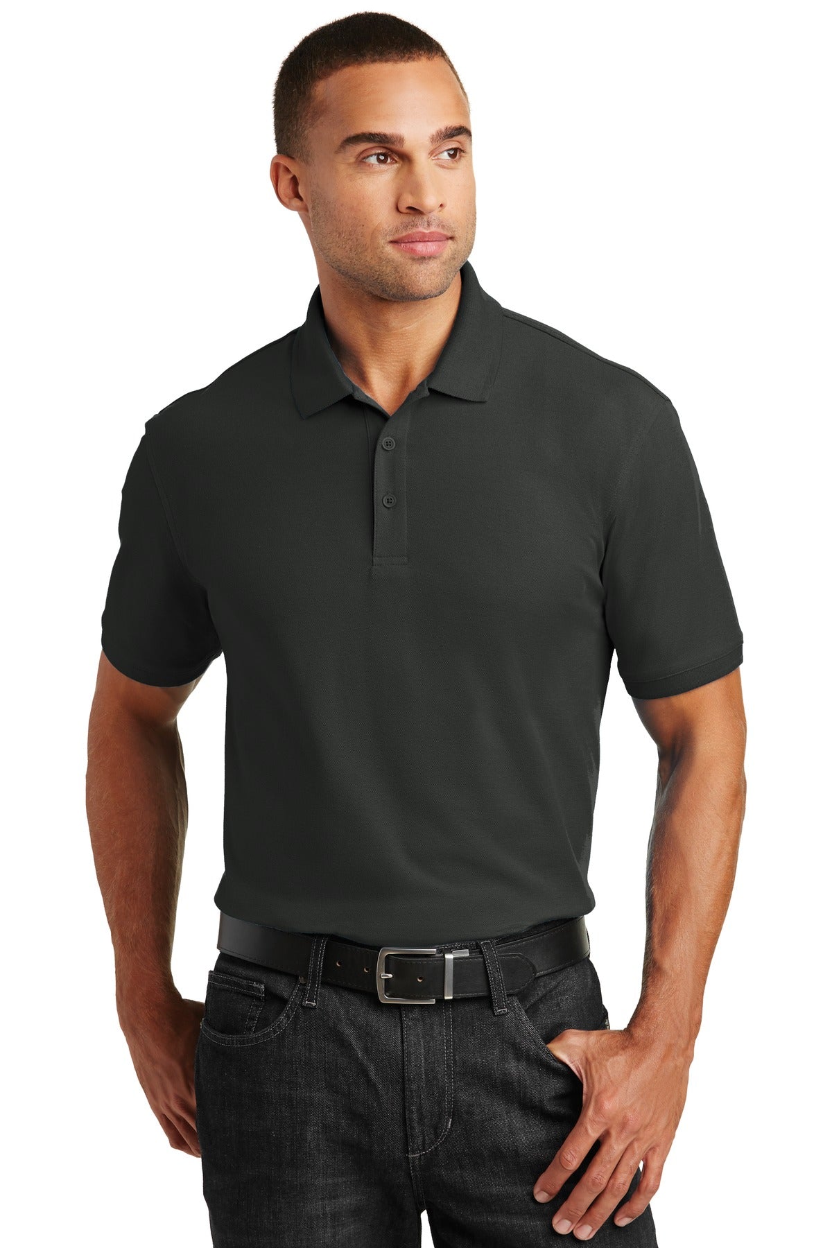 Tall male model 6'4 wearing a medium deep black Port Authority Tall Core Classic Pique Polo built for durability against a white background