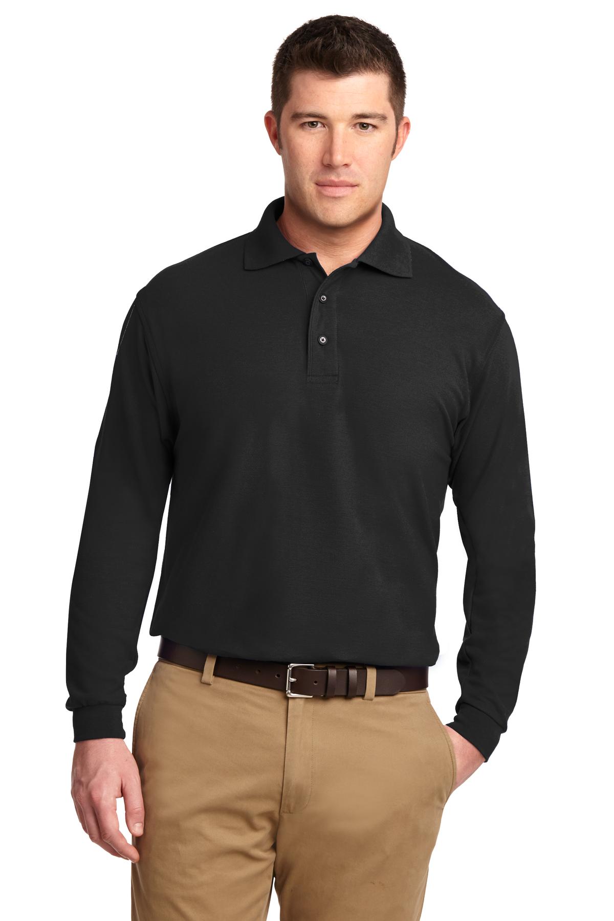 Tall male model 6'6 wearing a large black Port Authority Tall Silk Touch Long Sleeve Polo against a white background