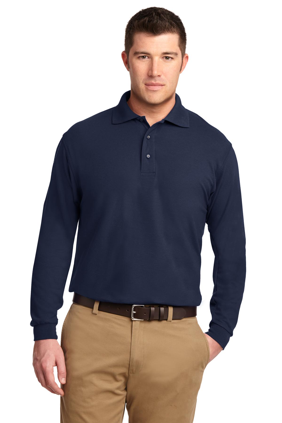 Tall male model 6'6 wearing a large navy Port Authority Tall Silk Touch Long Sleeve Polo against a white background