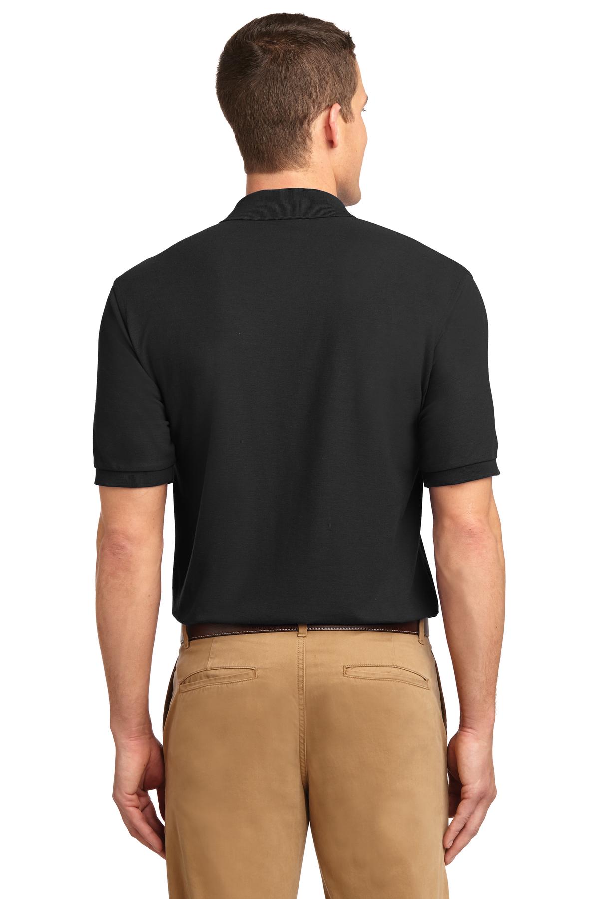 Tall male model 6'3 wearing a small Port Authority Tall Silk Touch Polo in color black with dyed buttons cotton/poly blend showing the back of the shirt against a white background
