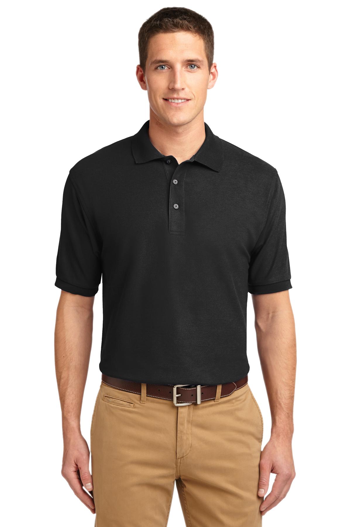 Tall male model 6'3 wearing a small Port Authority Tall Silk Touch Polo in color black with dyed buttons cotton/poly blend against a white background