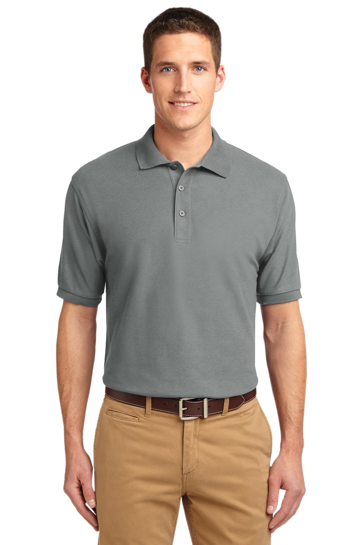 Tall male model 6'3 wearing a small Port Authority Tall Silk Touch Polo in color grey with dyed buttons cotton/poly blend against a white background