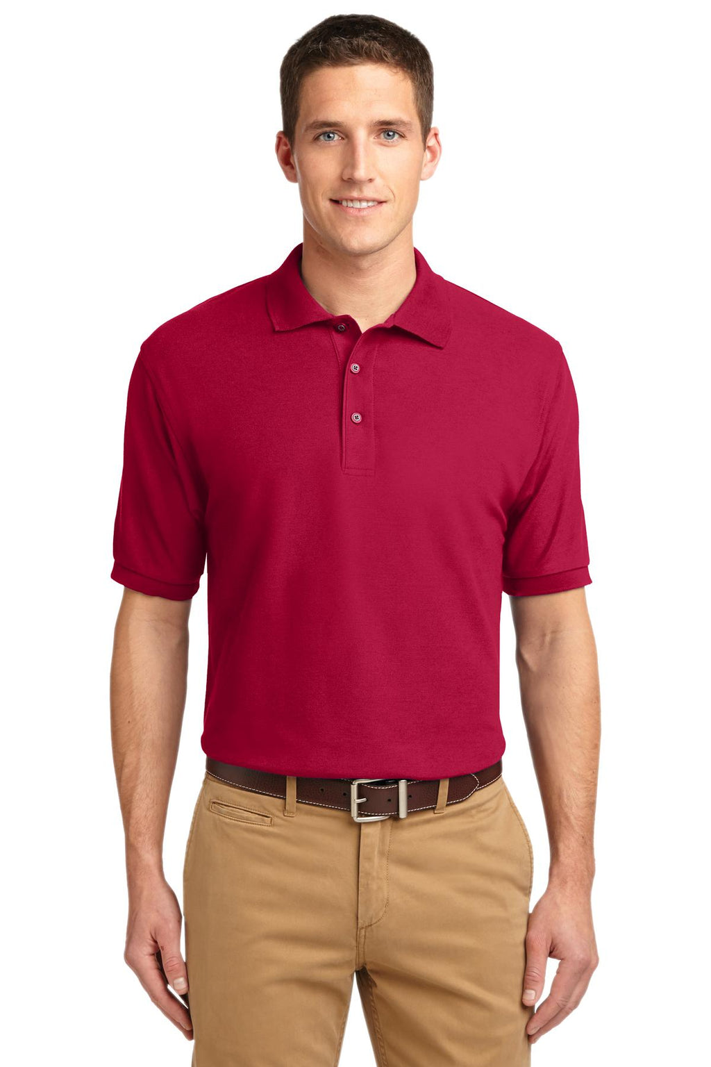 Tall male model 6'3 wearing a small Port Authority Tall Silk Touch Polo in color red with dyed buttons cotton/poly blend against a white background