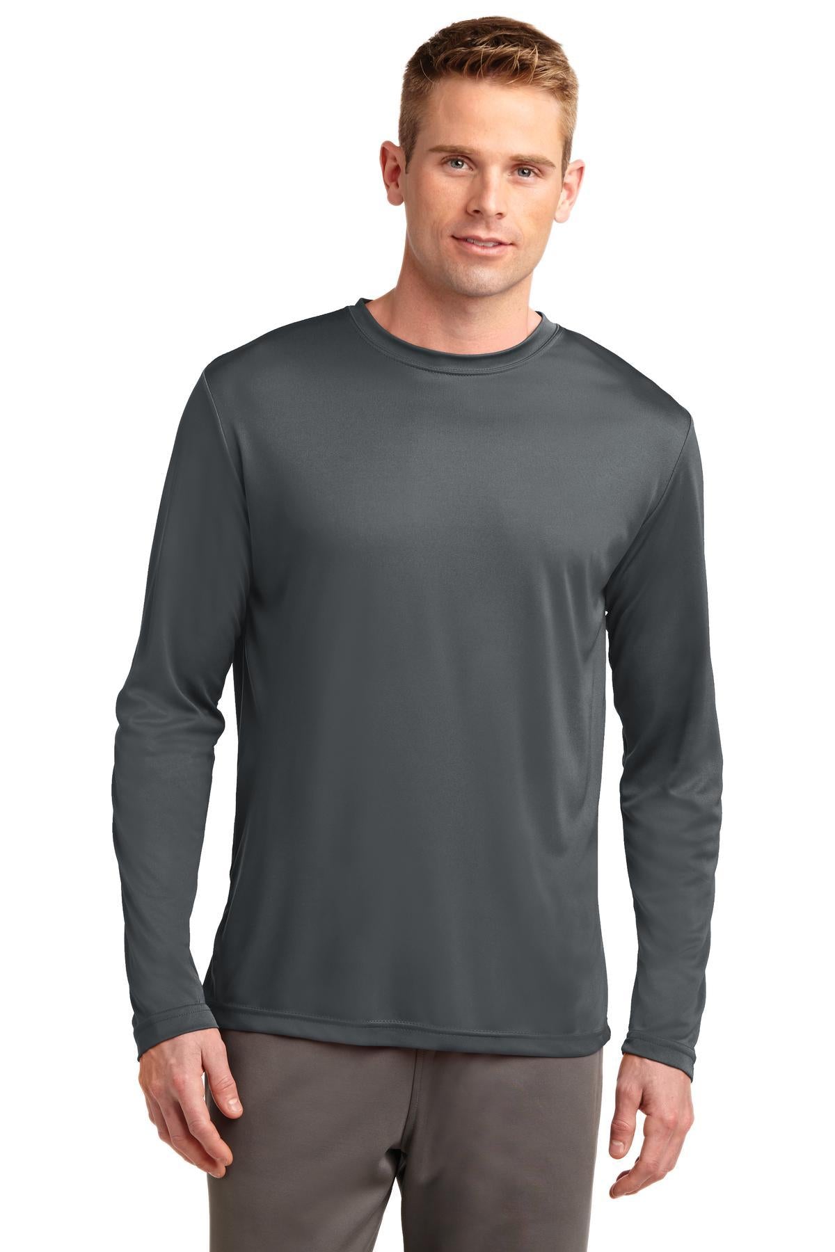 Tall male model 6,4 wearing an iron sport tek company long sleeve T shirt 100% poly Tee with removable tag for comfort against a white background