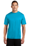 Tall male model 6,2 wearing a large atomic blue t shirt light weight breathable and roomy 100% polyester against a white background