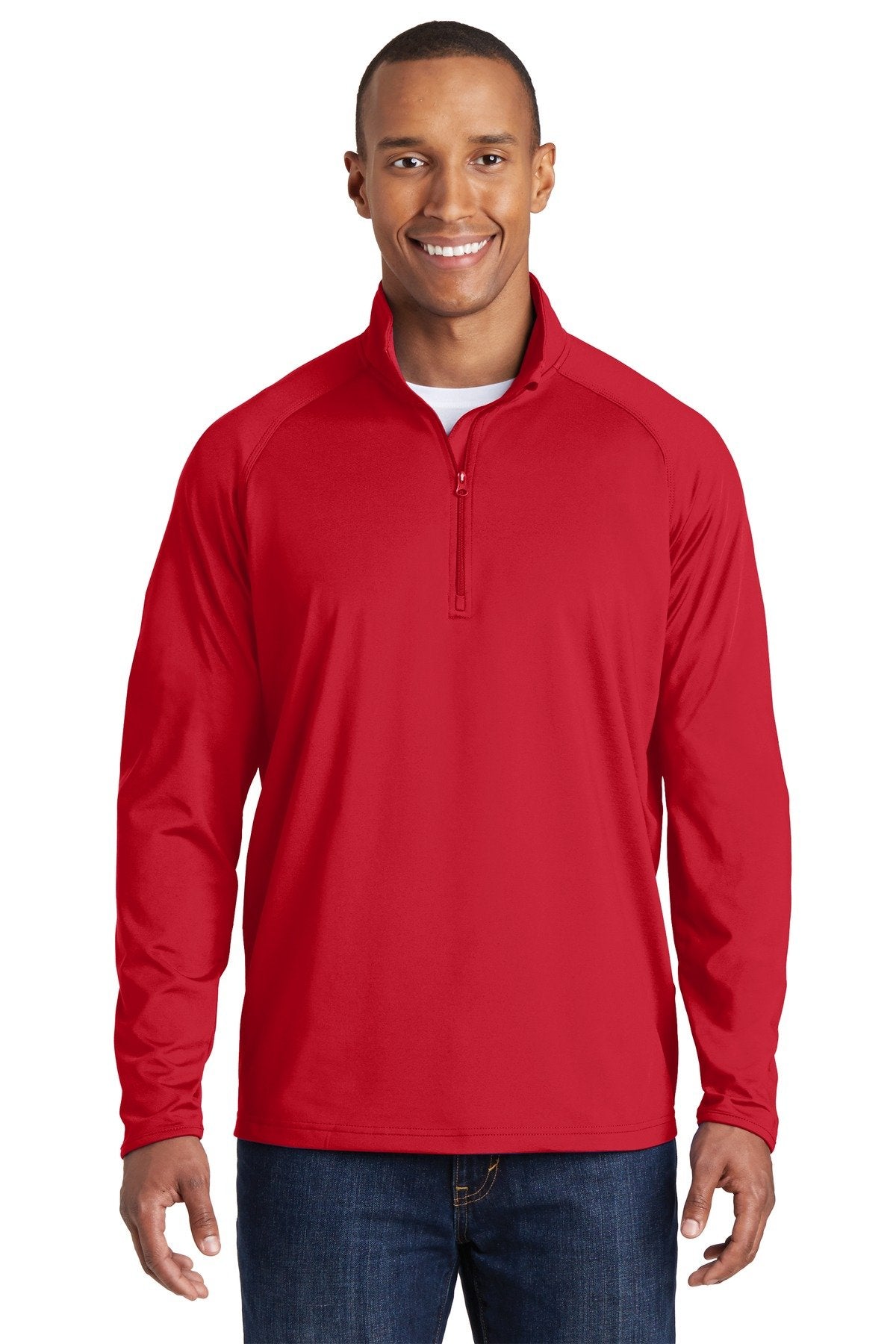 Tall male model 6'5 wearing a sport tek true red colored medium sport wick 90/10 poly/spandex designed for comfort against a white background 