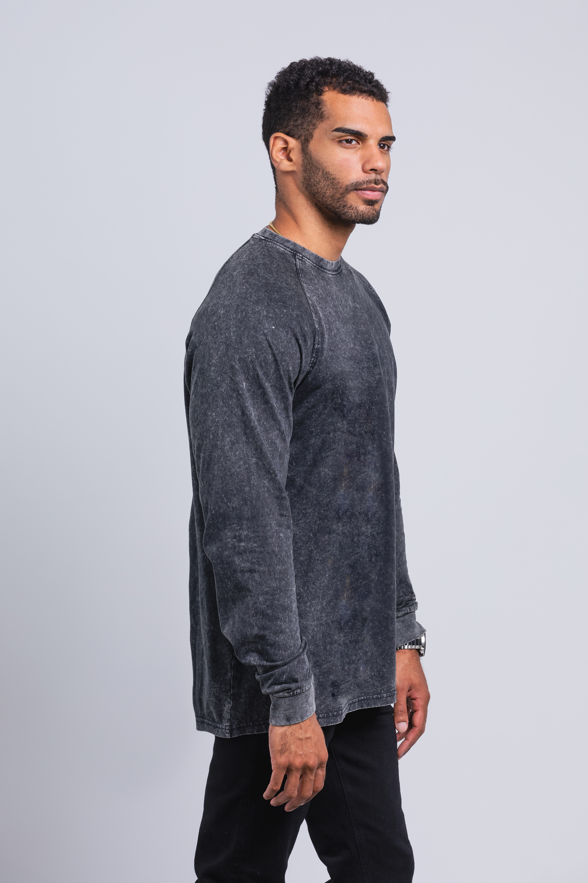 tall male model 6'5 wearing a large Have It Tall Raglan Long Sleeve Vintage Stone Wash 100% cotton preshrunk shirt side view against a white background.